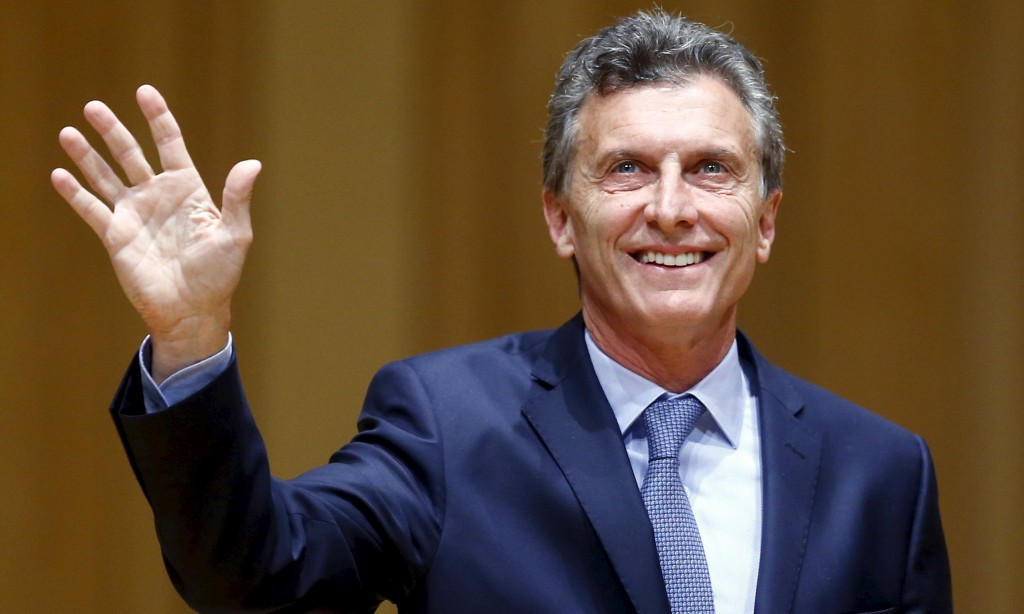 Argentina's President-elect Mauricio Macri acknowledges the audience as he attends the inauguration of incoming Buenos Aires' City Mayor Horacio Rodriguez Larreta (not seen) in Buenos Aires December 9, 2015. Macri's victory in a run-off last month turned Argentine politics on its head, ending 12 years of leftist populism under outgoing President Cristina Fernandez de Kirchner and her late husband and predecessor, Nestor Kirchner. Macri promises to remove state controls on the ailing economy and conduct more orthodox policies.REUTERS/Enrique Marcarian